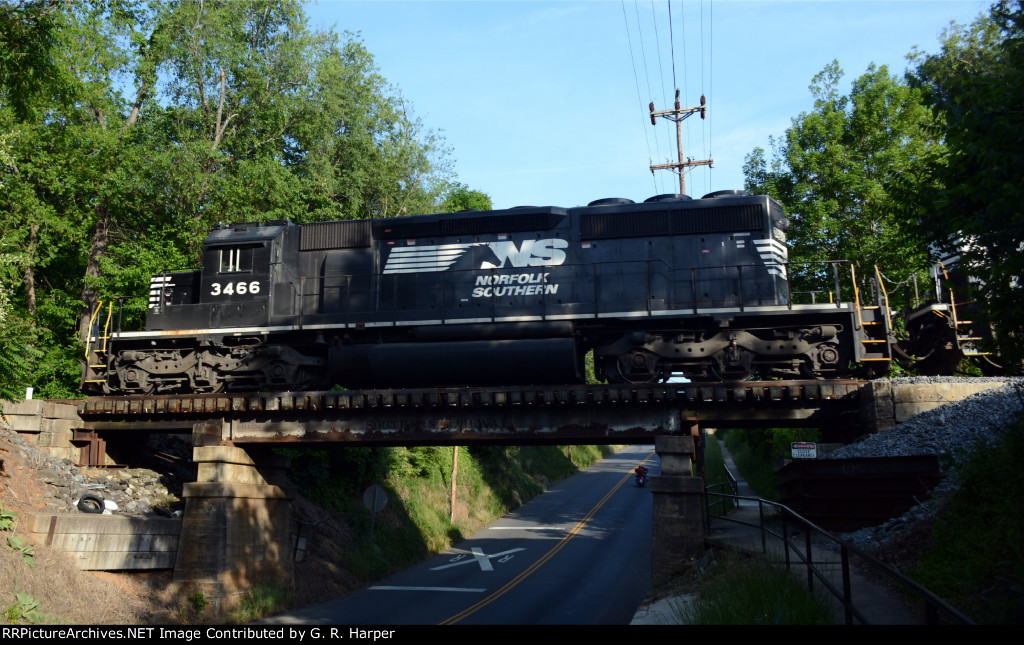 Lead unit of NS yard job E23 crosses Campbell Avenue on the Old Main Line